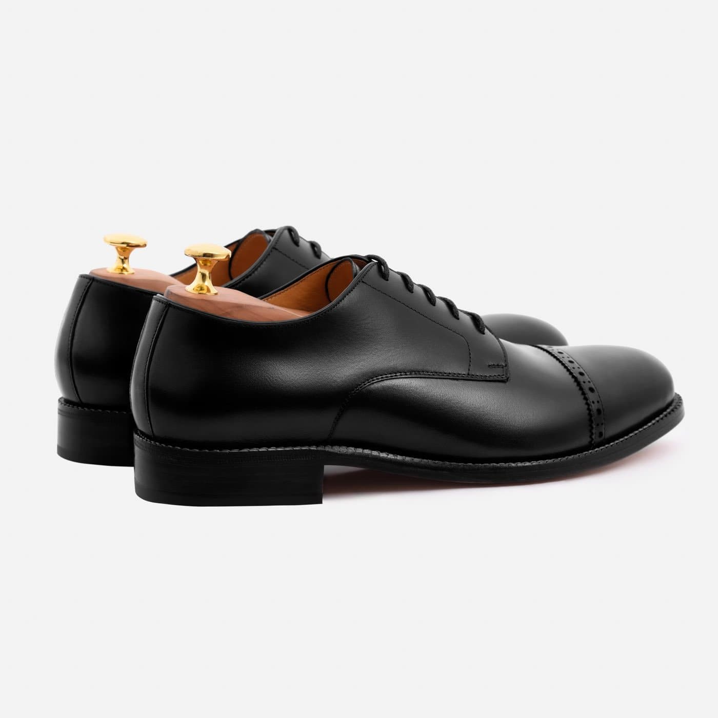Hernden cap deals toe derby